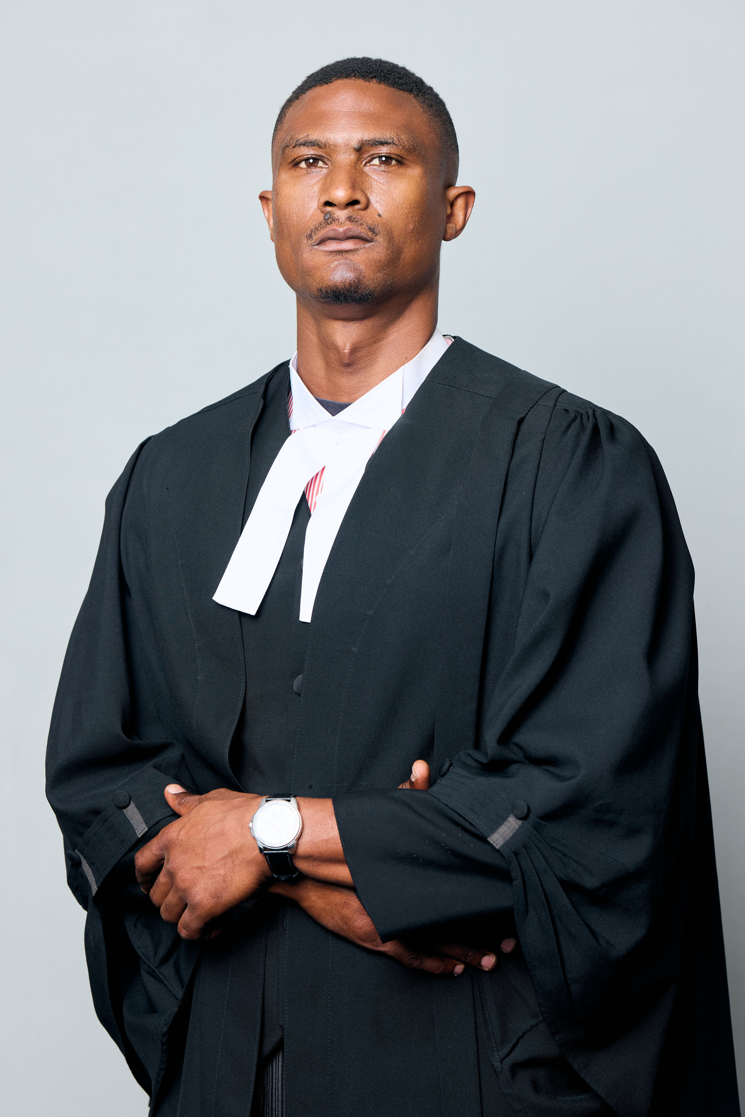 Mr. Theophilus Gausi, Associate